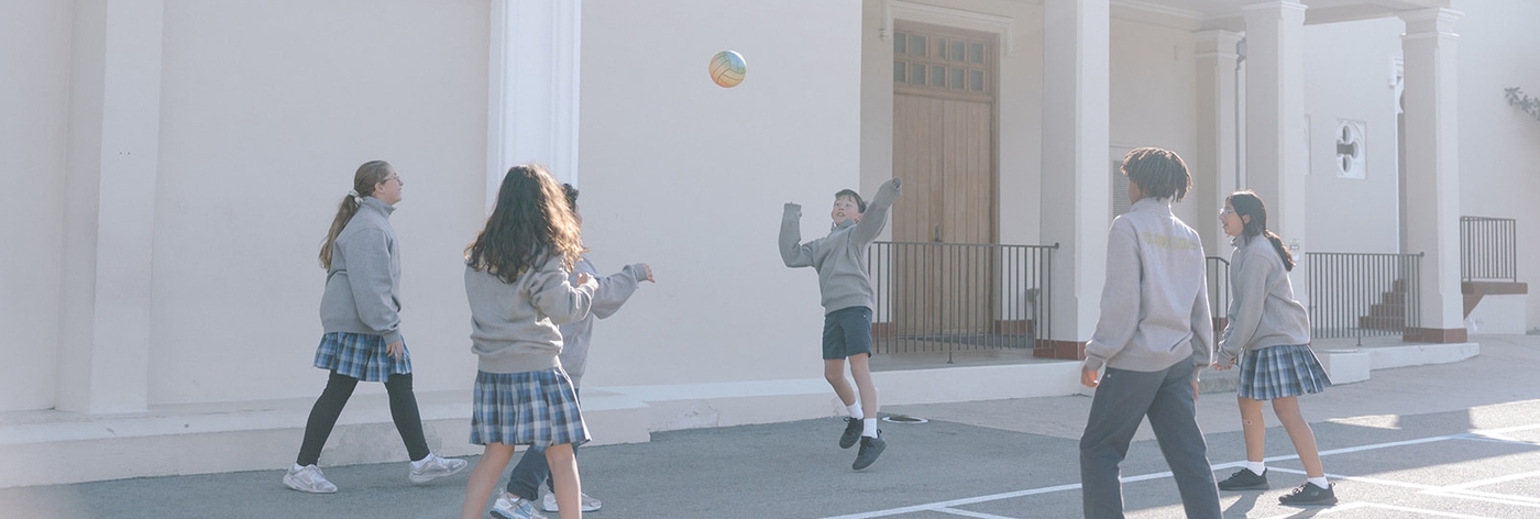 sTudents play with ball