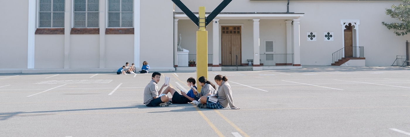 students reading outside
